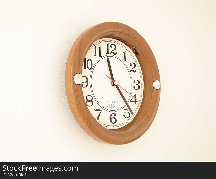 Wood clock on white background