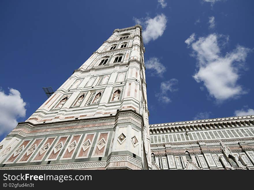 Giotto's Campanile - bell tower of famous Basilica di Santa Maria del Fiori, cathedral church of Florence in Italy