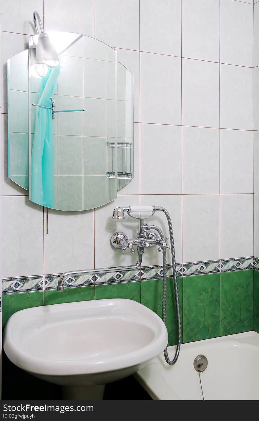 Modern bathroom of green colour