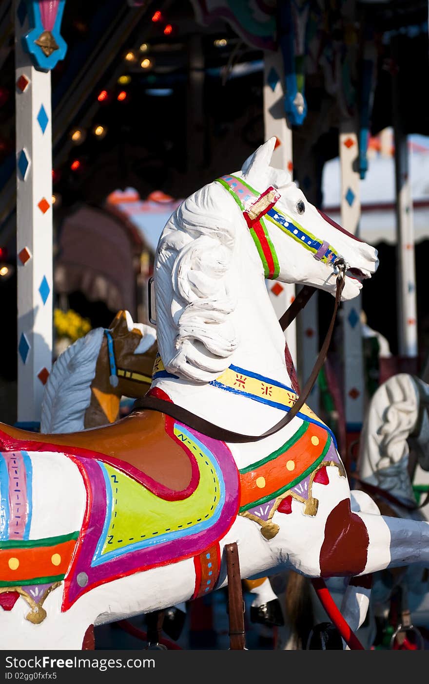 Old wood horse carousel on fun fair