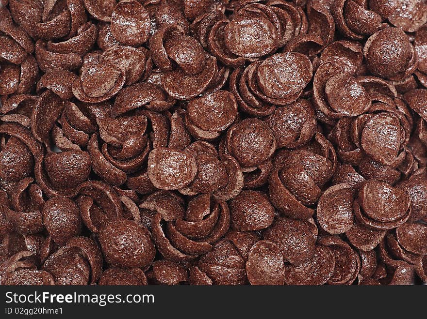 Food background - chocolate cereal flakes. Food background - chocolate cereal flakes
