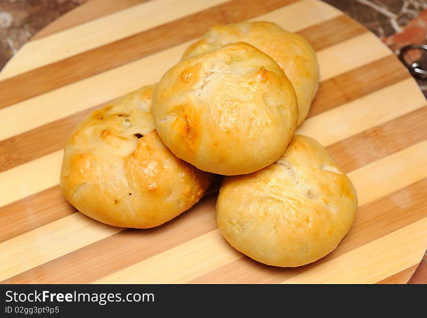 Four little breads out of the oven. Four little breads out of the oven