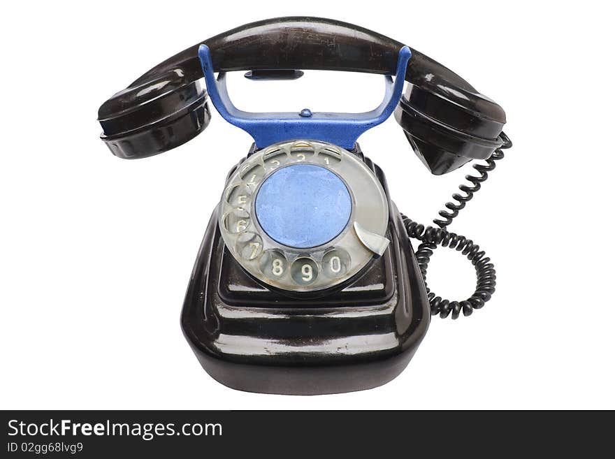 Old antique vintage traditional black phone with disc dials the 19th century isolated on white background . Russia. Old antique vintage traditional black phone with disc dials the 19th century isolated on white background . Russia.