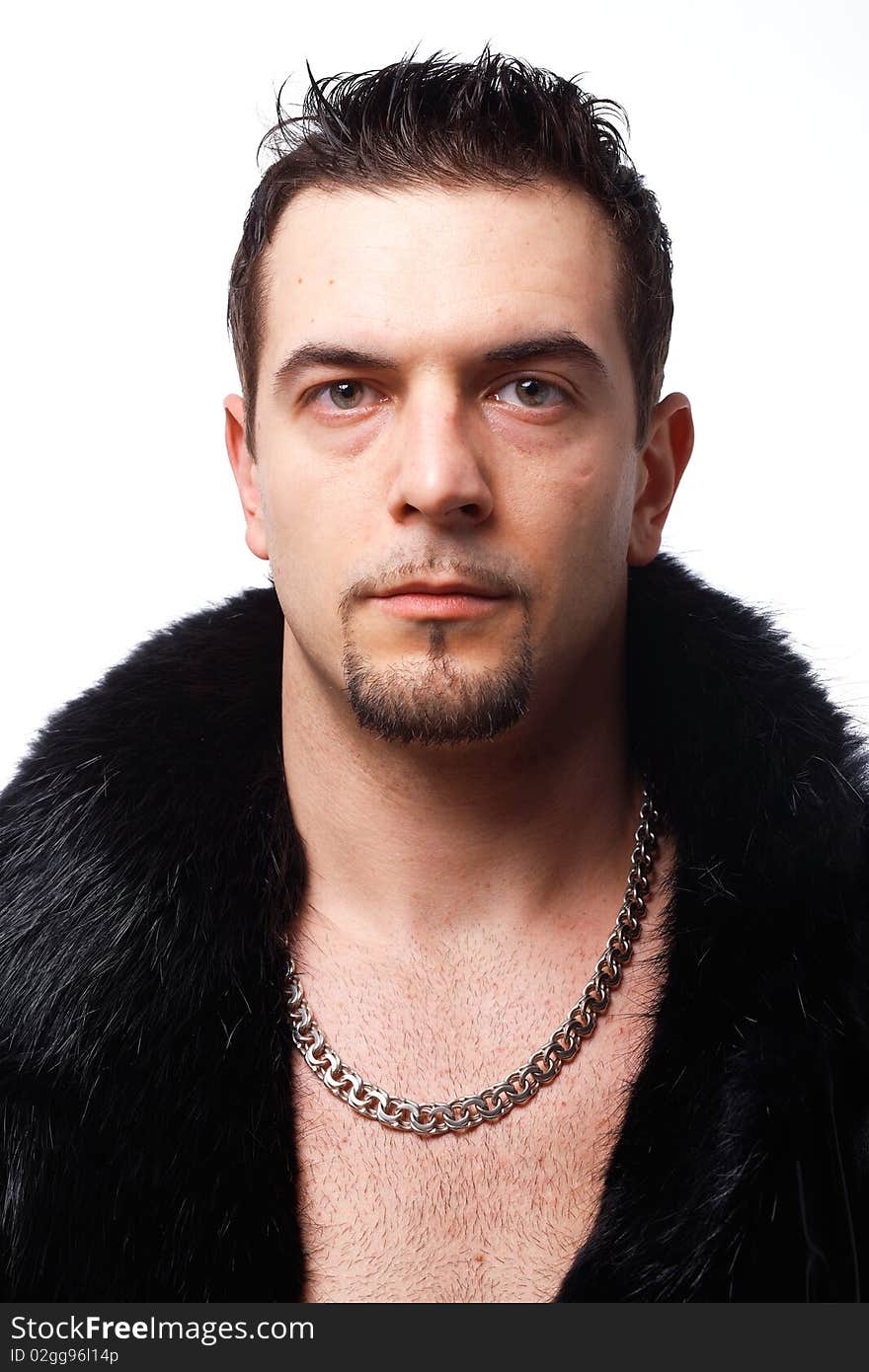 Close-up portrait of a handsome man in leather jacket over white background. Close-up portrait of a handsome man in leather jacket over white background.