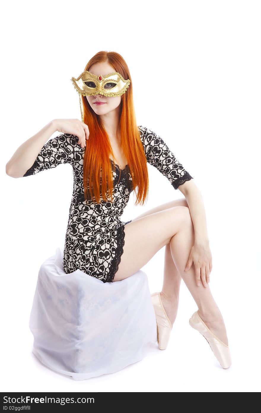 Ballet dancer with venetian mask