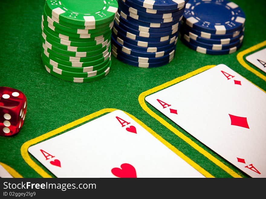 Casino concept shot in studio on green background. Casino concept shot in studio on green background