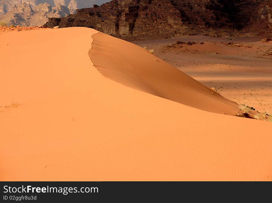 Red desert sand dune in Wadi Rum, Jordan