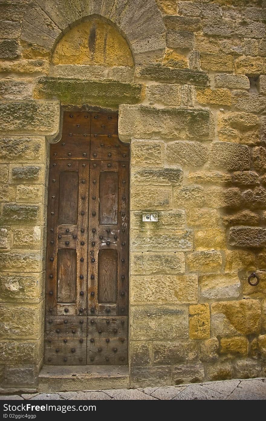 Ancient door in Volterra, Italy. Ancient door in Volterra, Italy