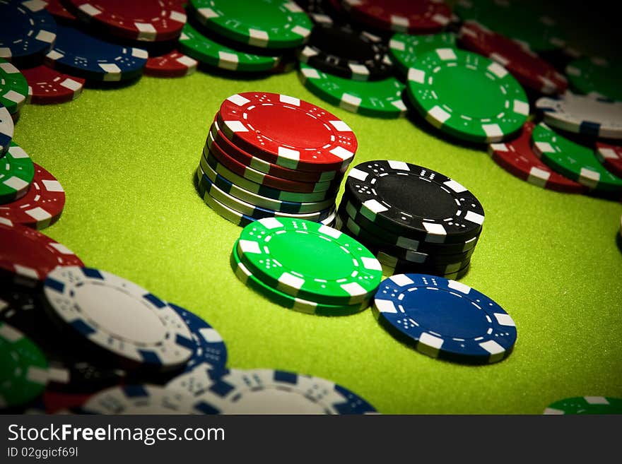 Casino Chips Closeup In Pointed Light