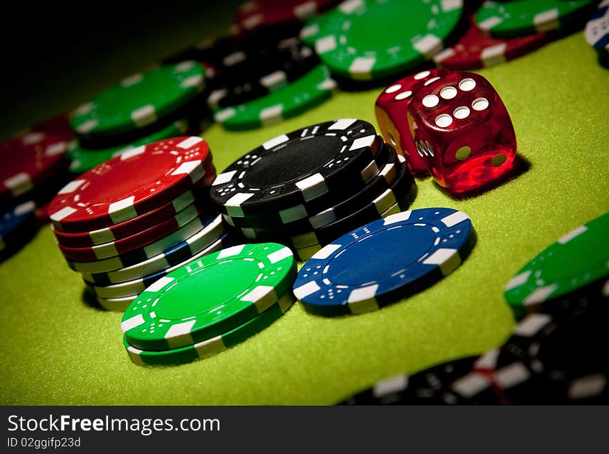 Casino concept shot in studio on green background. Casino concept shot in studio on green background