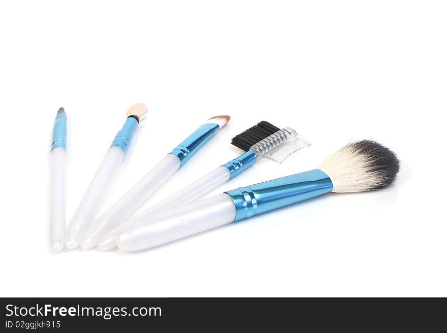 Brushes for cosmetics on a white background. Brushes for cosmetics on a white background