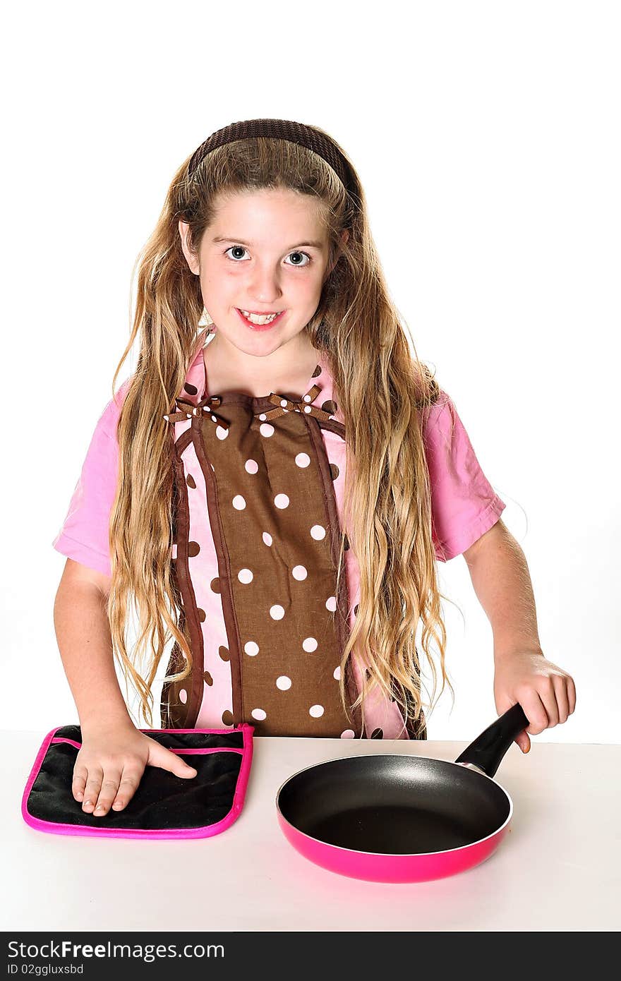 Little chef with apron ready to cook