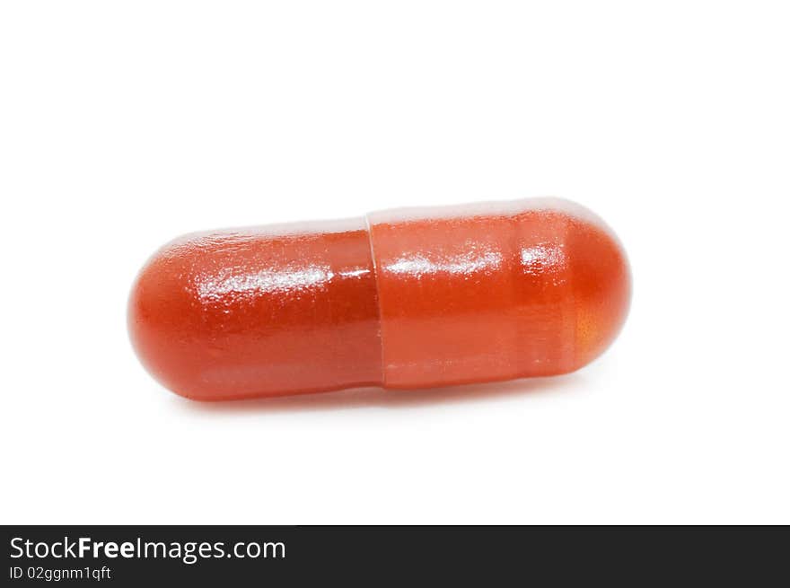 Red Pill Isolated Over White