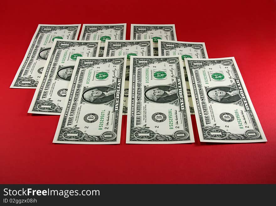 Dollars on a red background. Dollars on a red background