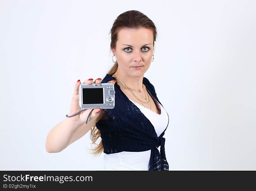 The attractive woman show YOUR photo on digital camera  on white background. The attractive woman show YOUR photo on digital camera  on white background