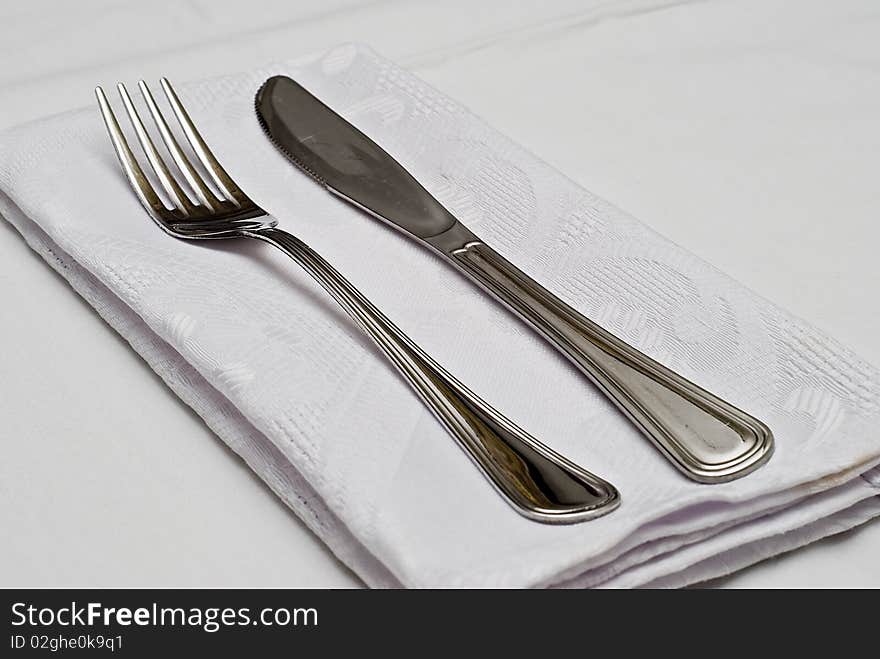 Cutlery on the table prepared to eat. Cutlery on the table prepared to eat.