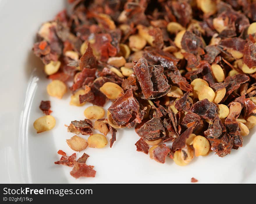 Chili pepper peppercorns on white background