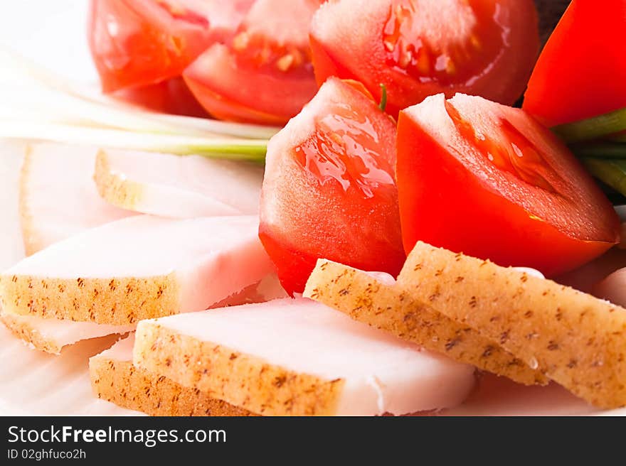 Fresh tomato and fat isolated ower white. Fresh tomato and fat isolated ower white