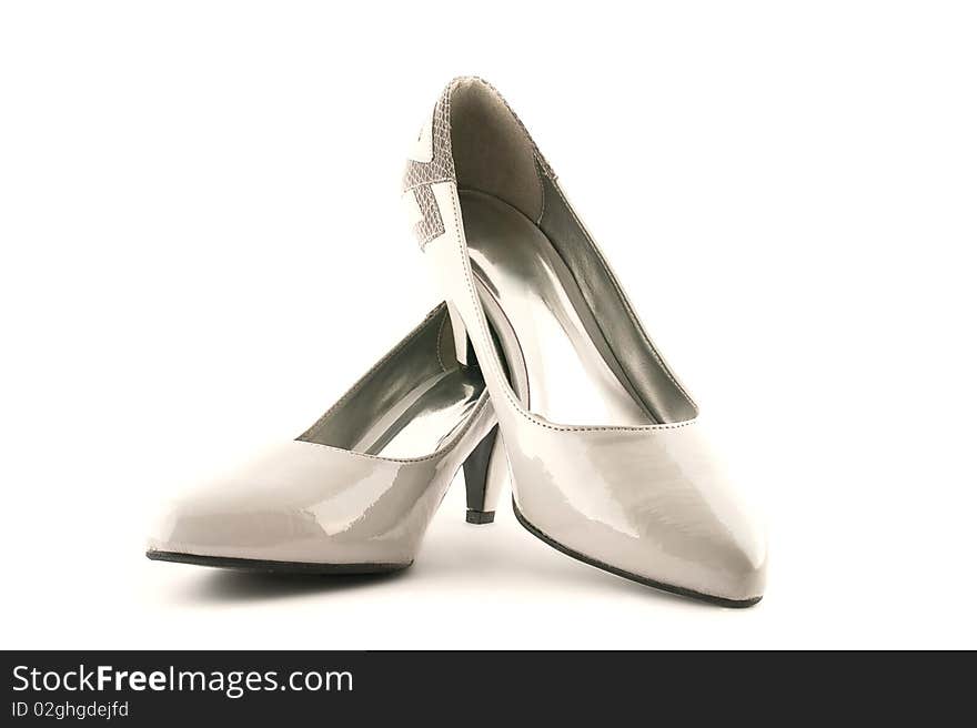 White female shoes on a white background