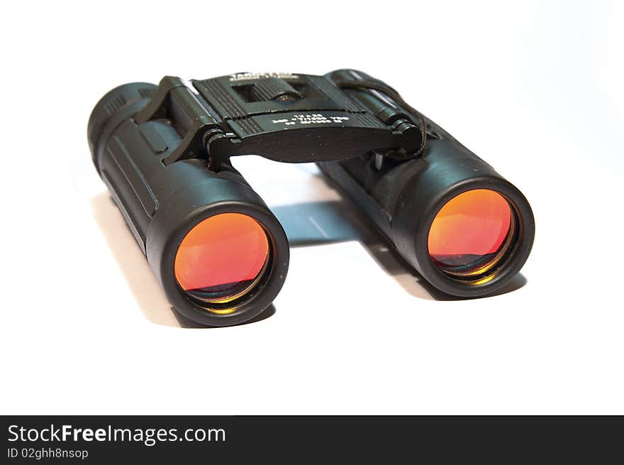 Black binoculars on a white background