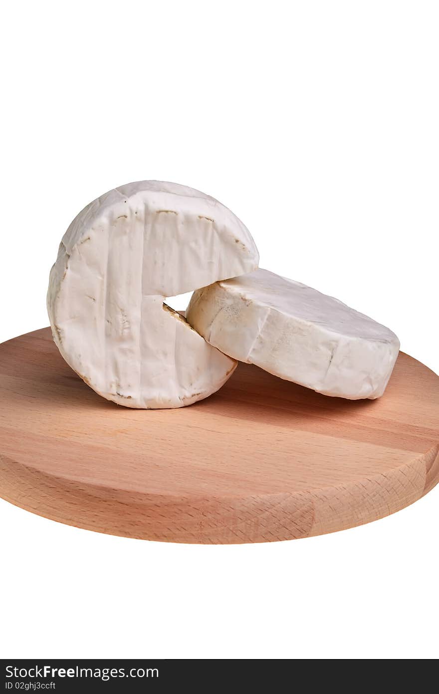 Camembert cheese blocks on wooden board. Camembert cheese blocks on wooden board.