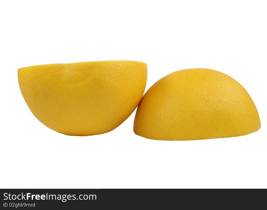 Two halves of fruit pomelo lie nearby