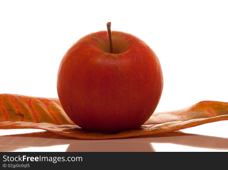 Red apple with reflection on isolated white background