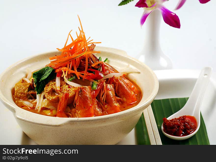 A prawn curry noodles image on the white background