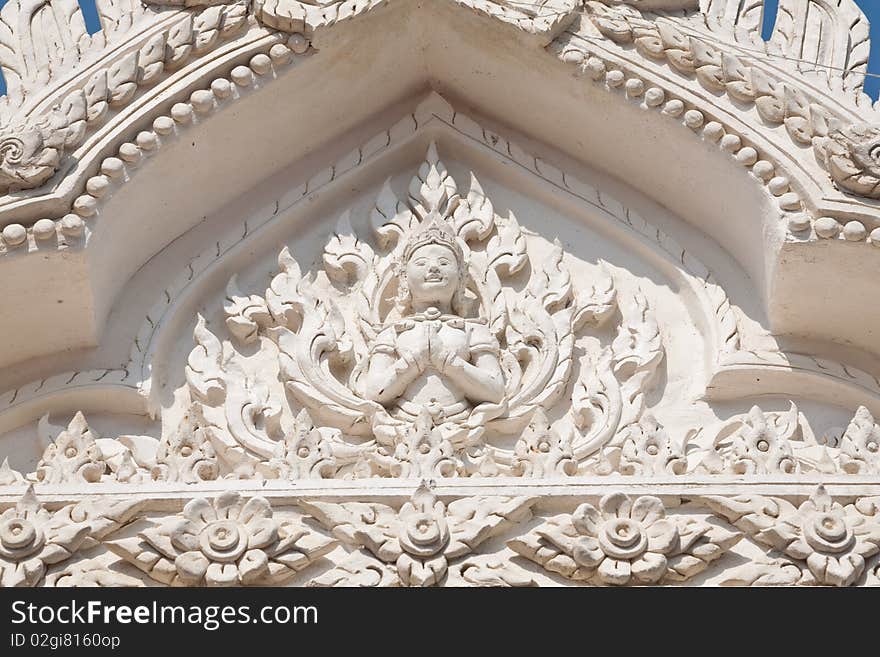 Thai Carved Angel at the temple door, Petchburi Thailand