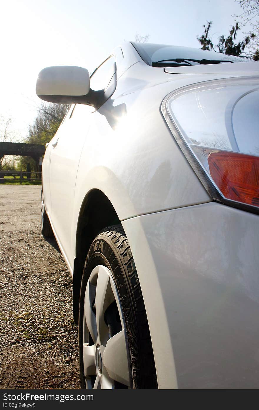 A small white car front view.