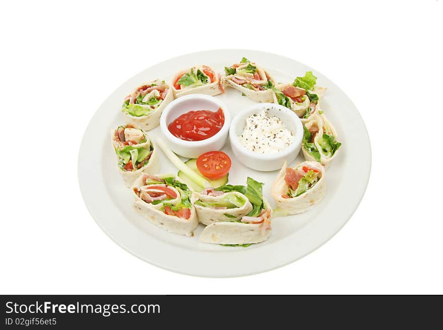 Bacon lettuce and tomato bread wraps with dips on a plate