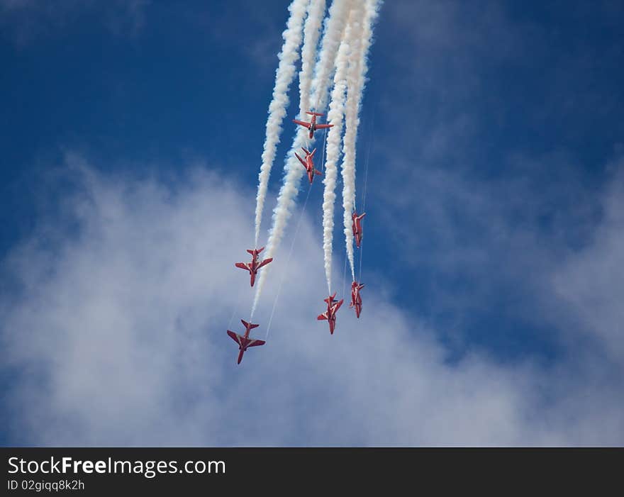 Seven Red aircraft in formation. Seven Red aircraft in formation