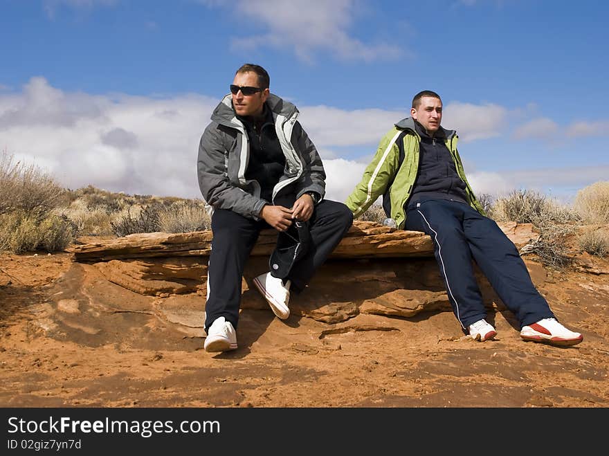 2 hikers resting in a wild desert Arizona, USA. 2 hikers resting in a wild desert Arizona, USA