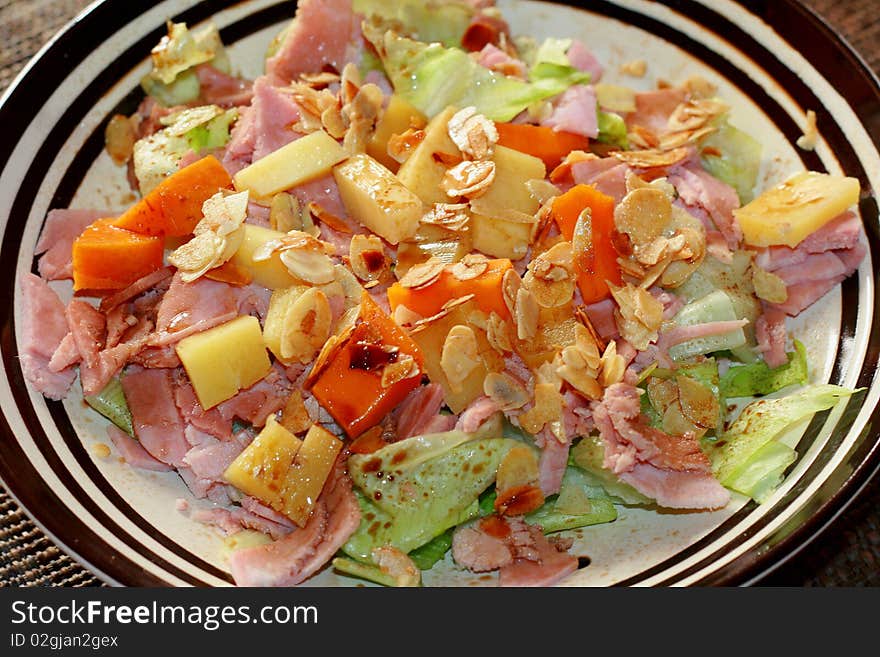 Salad of season with cheese and fresh vegetables