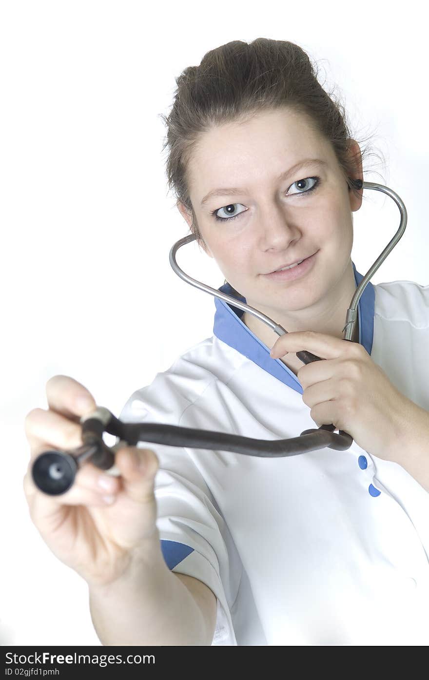 Nurse with stethoscope looking at camera