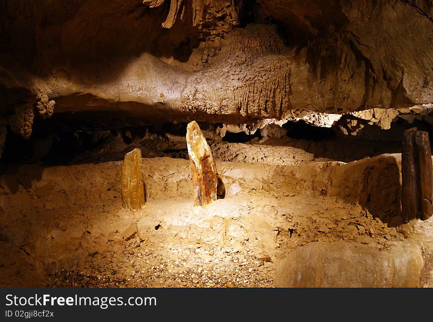 Stalactites and stalagmites in ancient caves of Borneo.