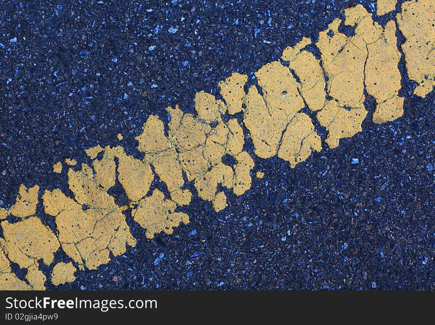 Grunge Asphalt Texture Background With Yellow Line