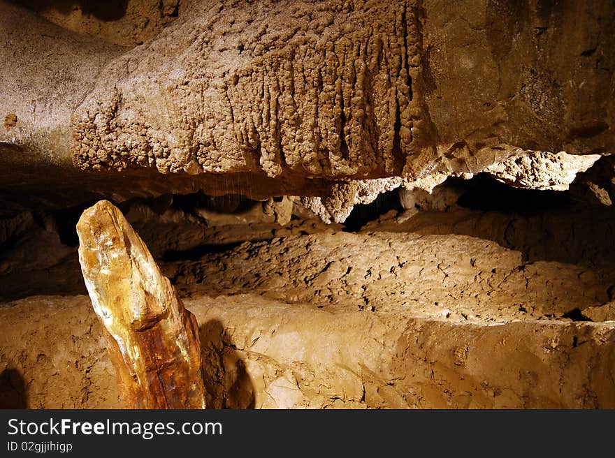 Stalactites and stalagmites in ancient caves of Borneo.