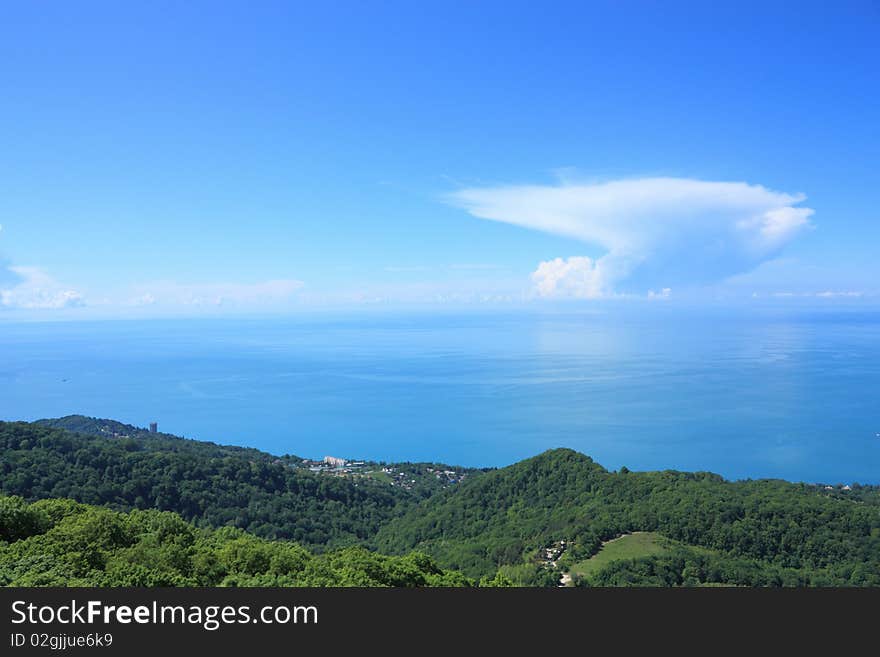 Storm cloud is formed over the sea near to sea coast. Storm cloud is formed over the sea near to sea coast