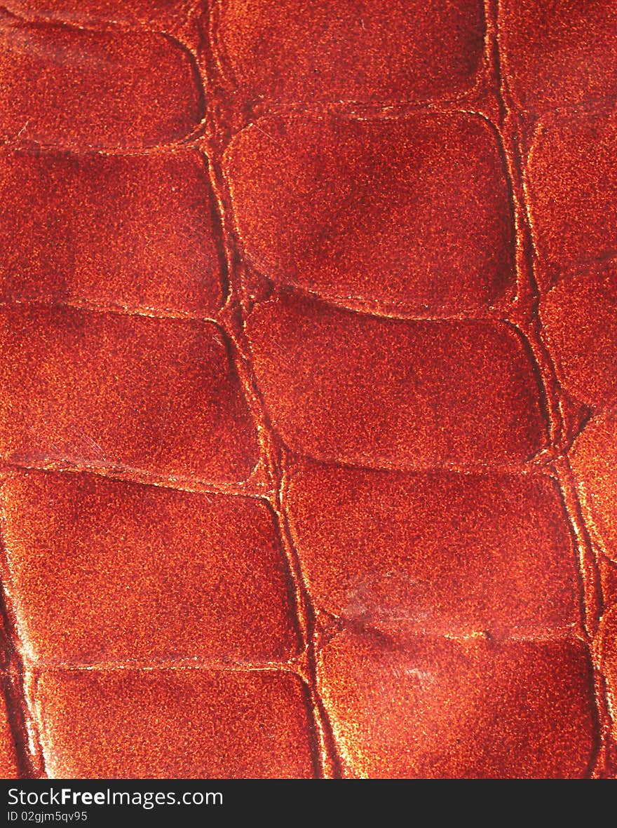 Brown leather background.Alligator skin