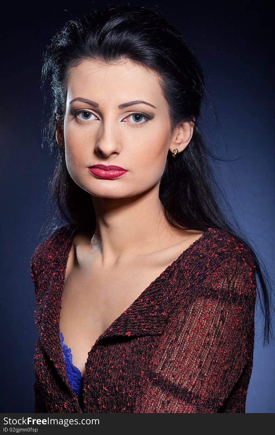 Studio portrait of attractive young woman