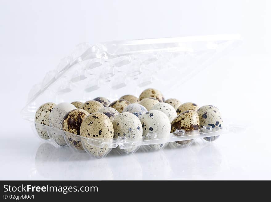 Close-up view of a tray of quails eggs. Close-up view of a tray of quails eggs