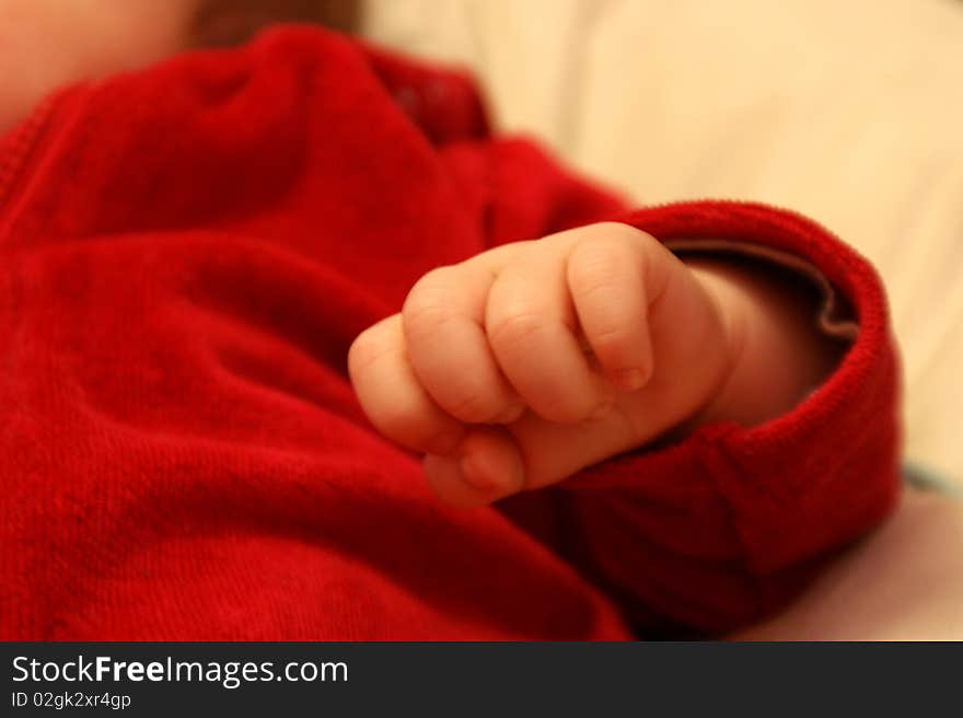 A close up of a baby's small hand. A close up of a baby's small hand