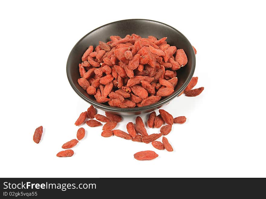 Goji Berries In A Black Dish