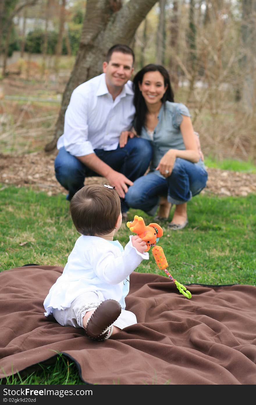 Beautiful family enjoying the park. Beautiful family enjoying the park