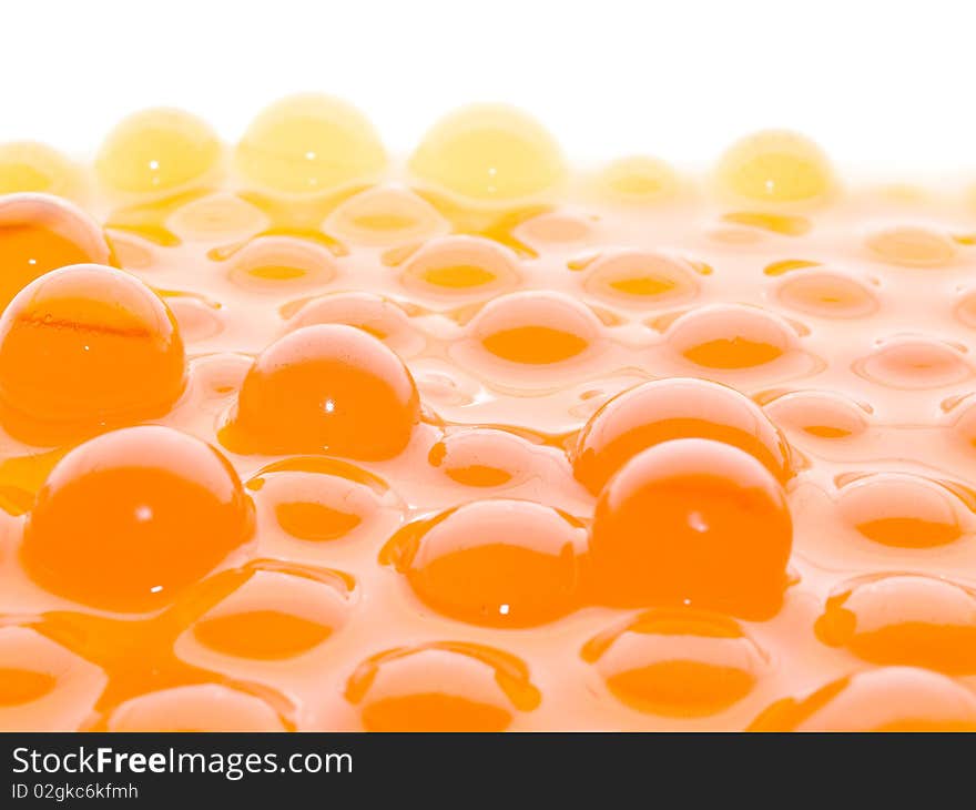 A lot of semitransparent orange balls on white background. A lot of semitransparent orange balls on white background.