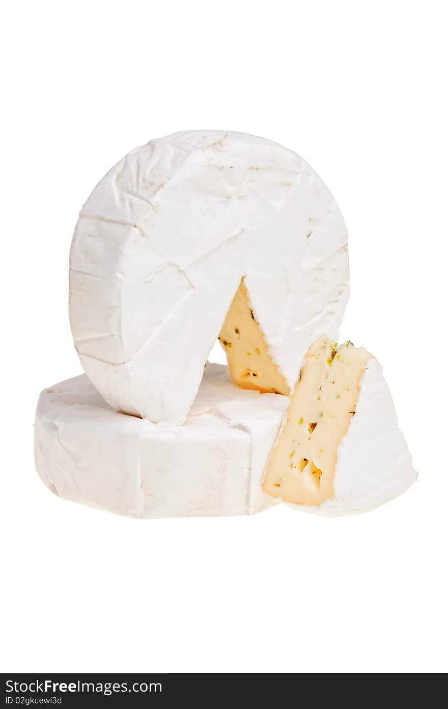 Stacked round cheese blocks with cut out segment over white background. Stacked round cheese blocks with cut out segment over white background.