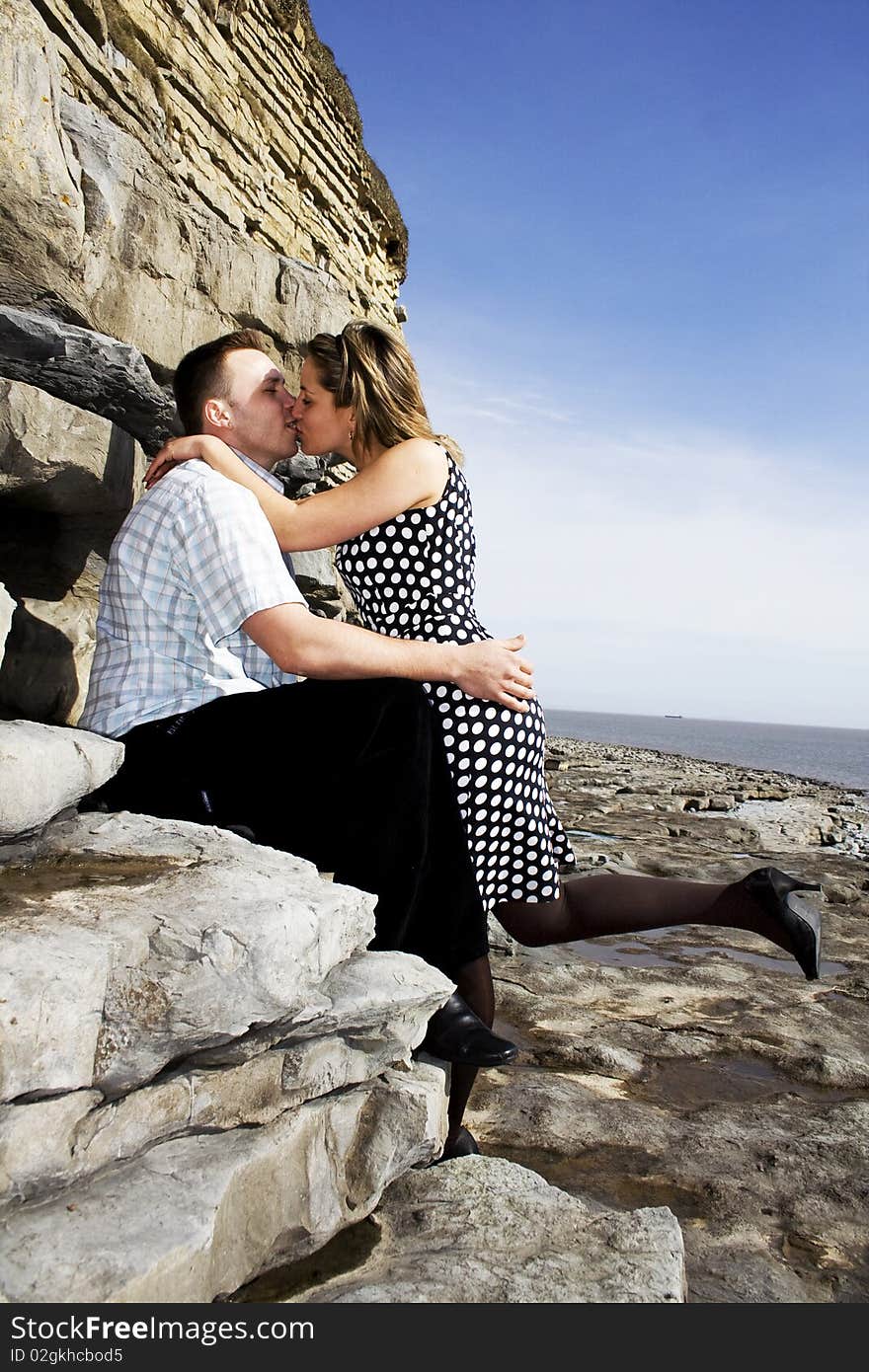 Couple kissing on the beach. Couple kissing on the beach