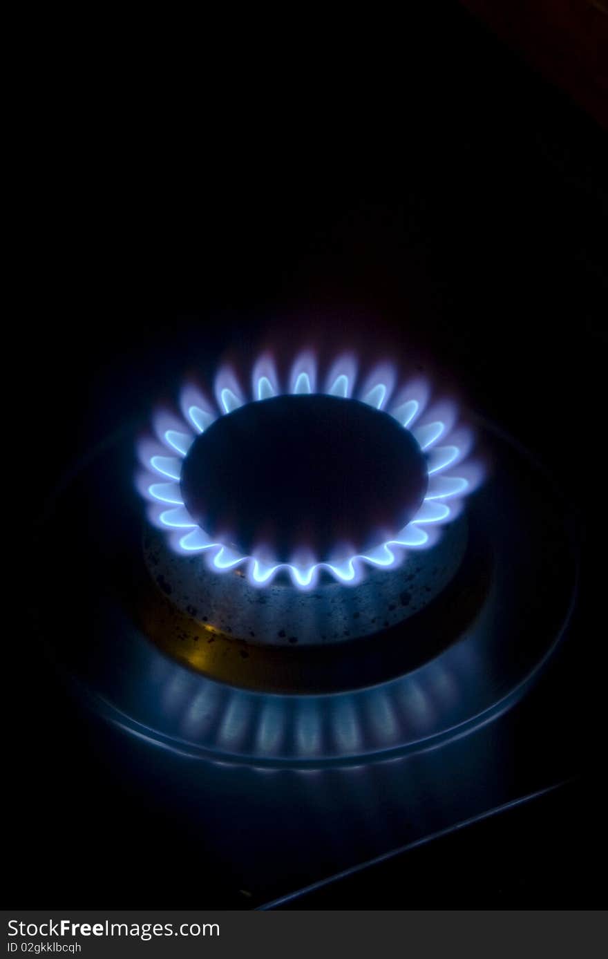 Blue flame of burning gas in kitchen stove. Blue flame of burning gas in kitchen stove