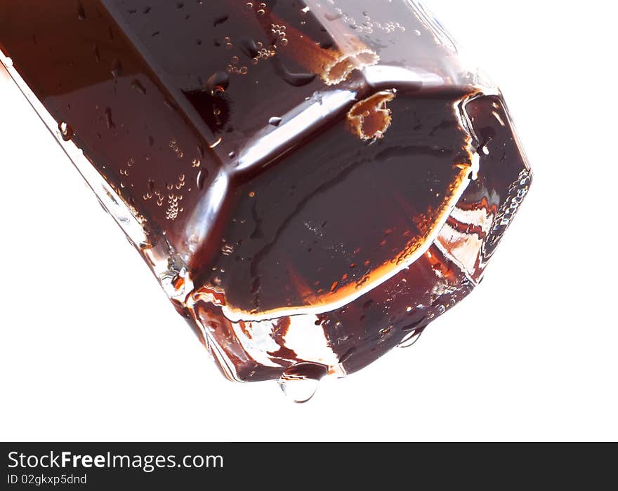 Soda in a glass, a white background